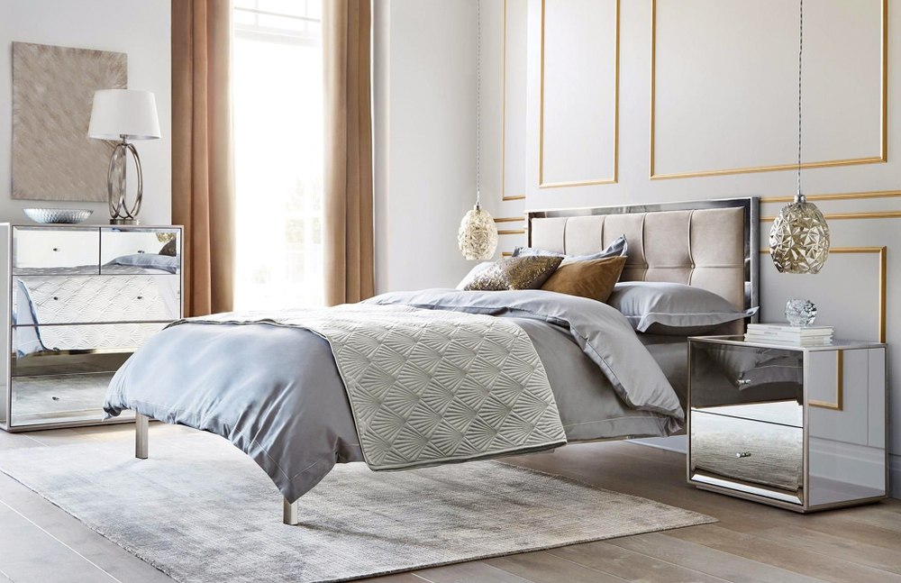 Modern gray bedroom with upholstered headboard
