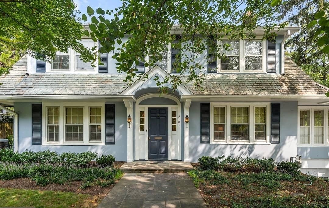 Light blue Colonial home in Cleveland Park, Washington, DC. Photo by Instagram user @longandfoster