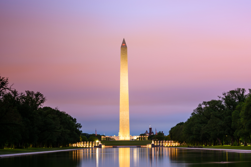Washington Monument and its reflecting pool at dusk