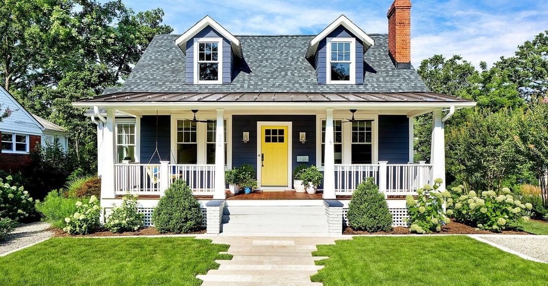Cottage-style home with cozy front porch and yellow door in Walnut Creek. Photo by Instagram User @gordonreesedesignbuild