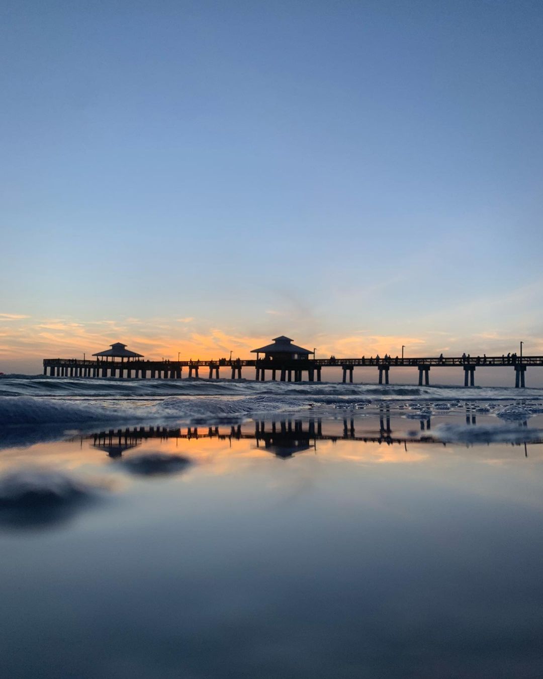 Sunset Photo of the Pier at Fort Myers Beach. Photo by Instagram user @ocana.photography