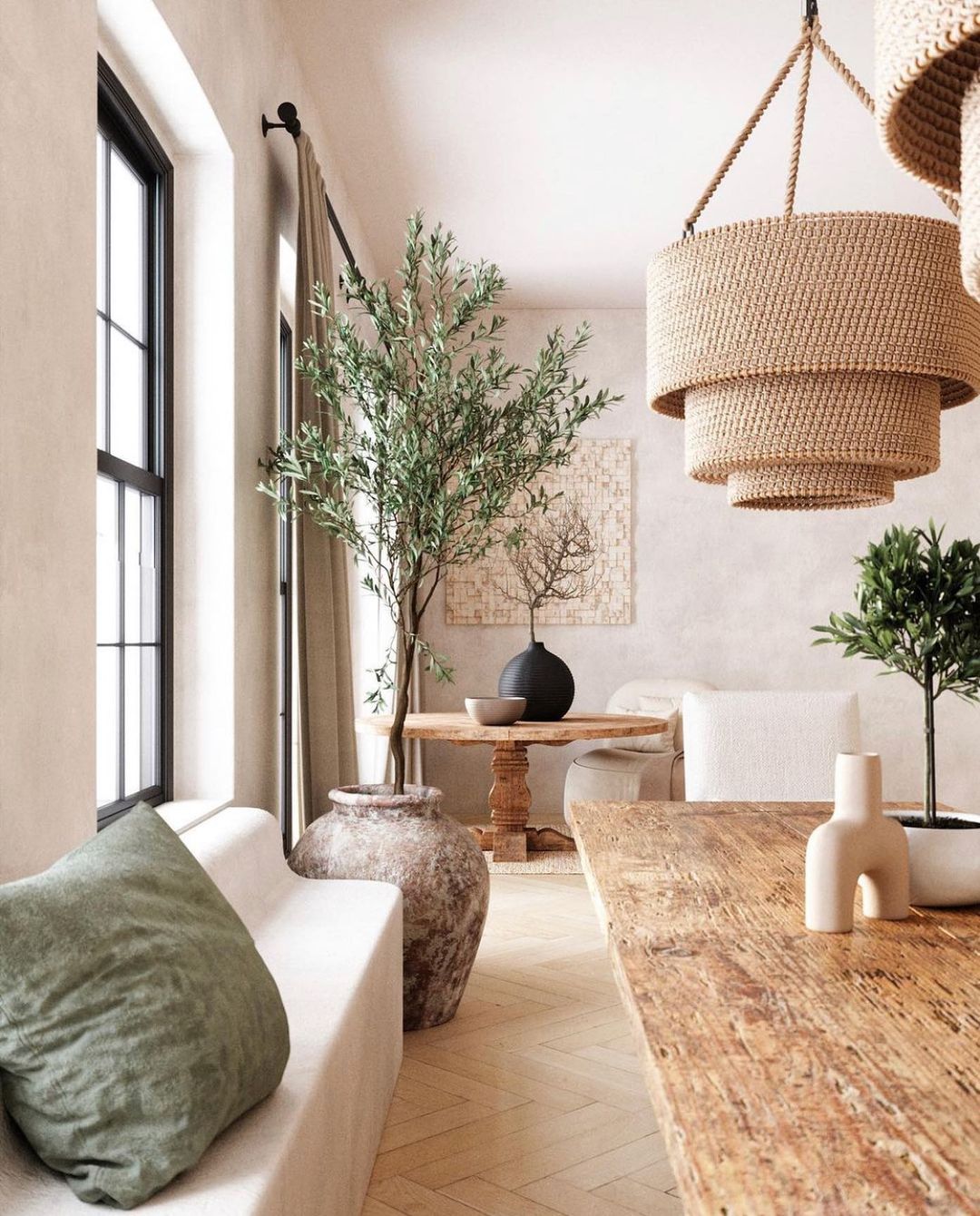 Light, airy dining room with potted accent plants. Photo by Instagram user @my_atmosphera