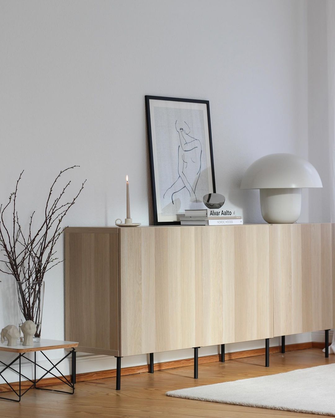 Naturally colored light wood sideboard with clean lines. Photo by Instagram user @neutral_at_home 