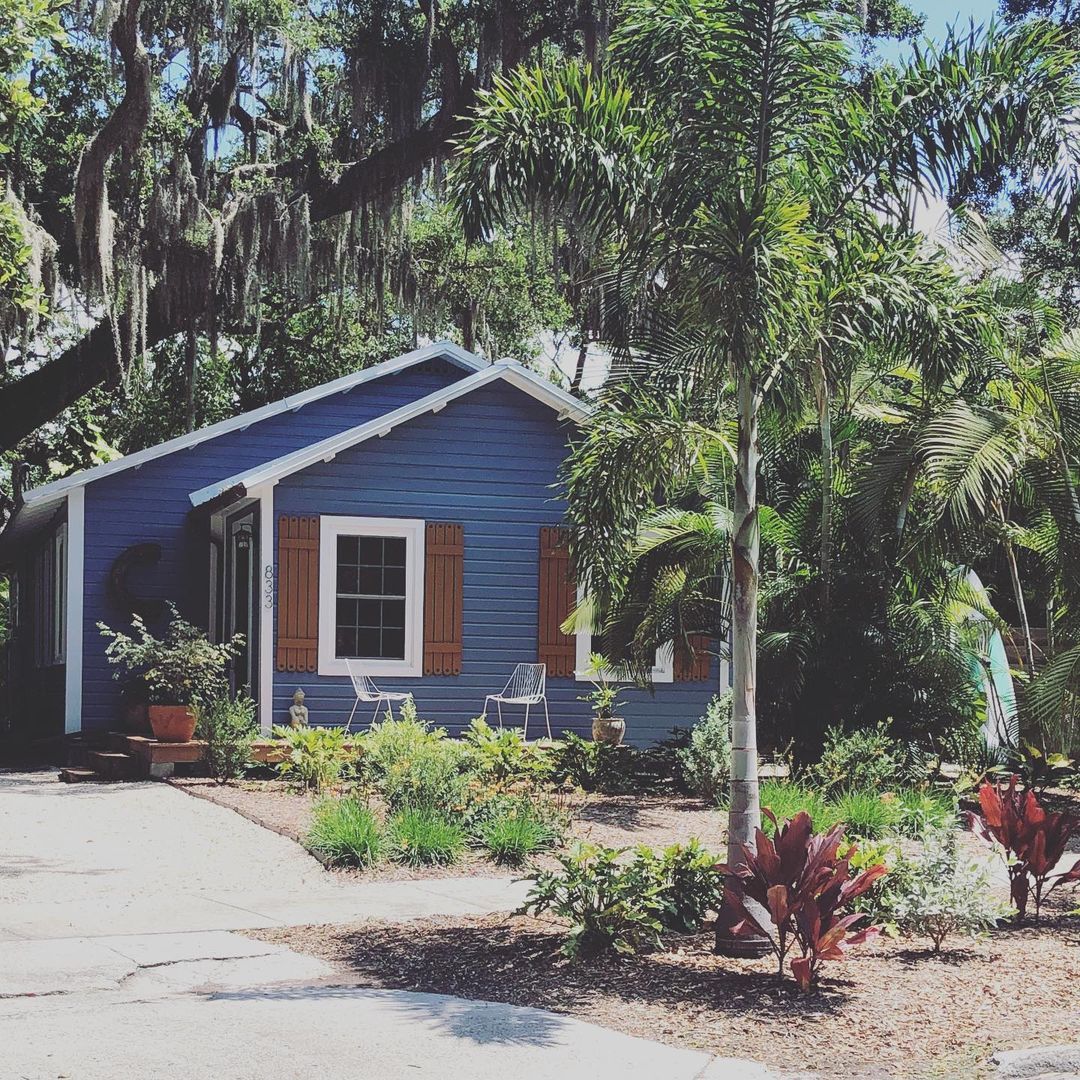 Blue single-story home in Indian Beach-Sapphire Shores in Sarasota, FL. Photo by Instagram user @windsorluxuryproperty