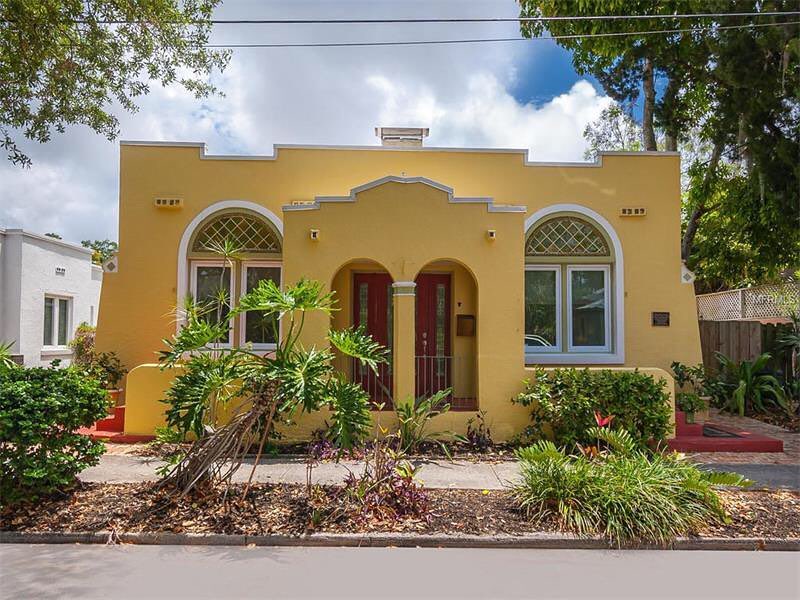 Yellow Spanish-style mission home in Laurel Park, Sarasota, FL. Photo by Instagram user @cailgrande