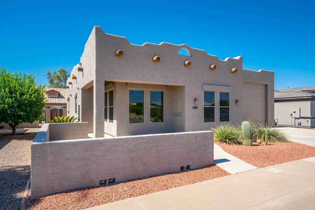 Adobe-style home with beautiful landscaping in Mesa, Arizona. Photo by Instagram User @shannadayteam