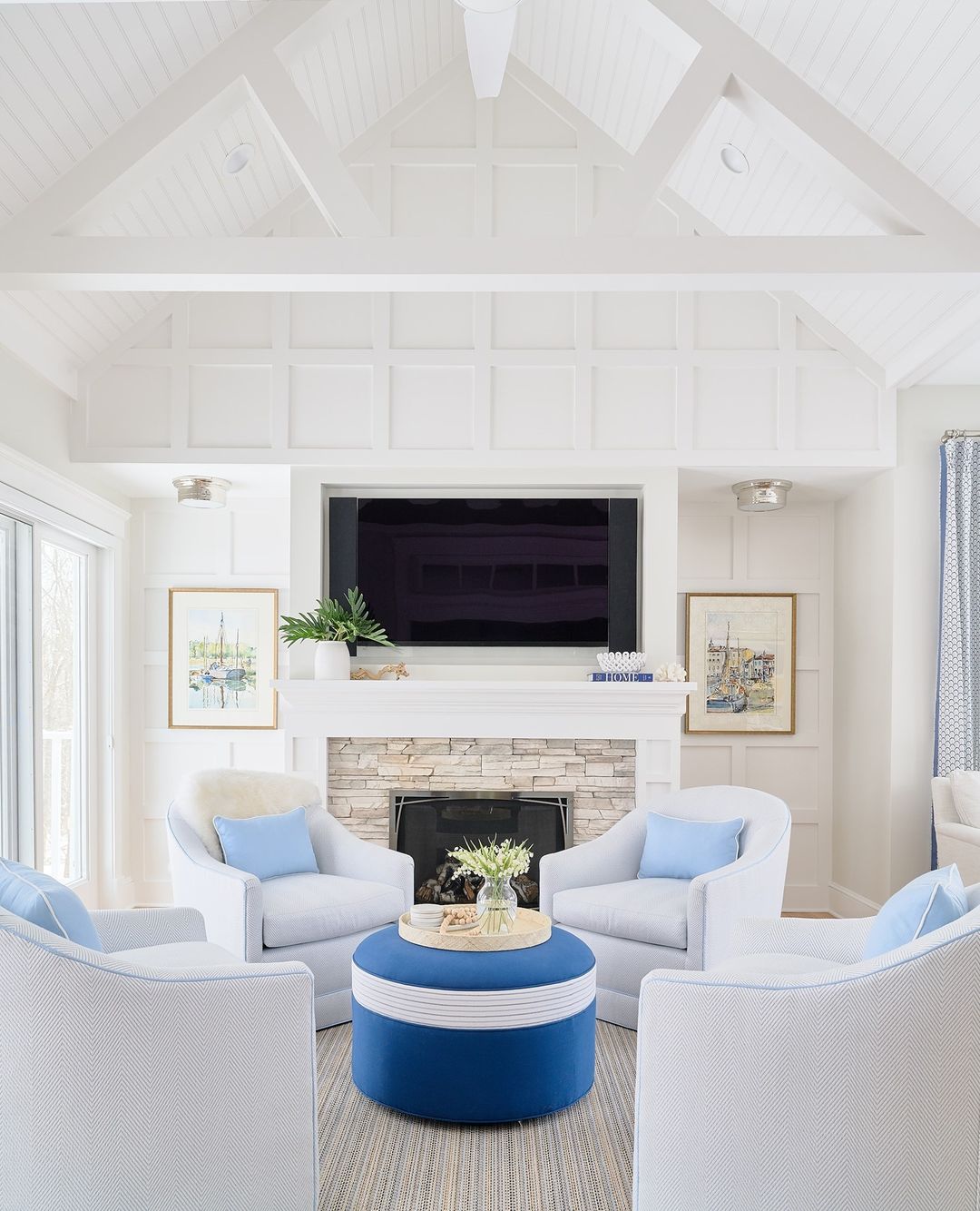 Coastal Style Living Room with TV Mounted on Wall. Photo by Instagram user @blakelyinteriordesign