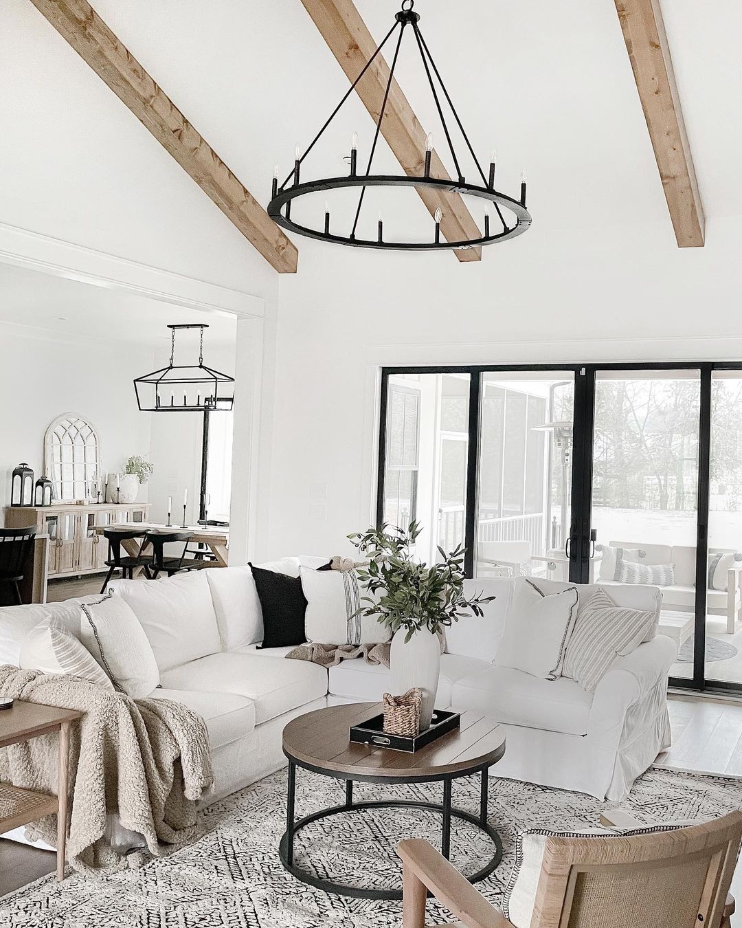 Farmhouse Style Living Room with Large White Sectional. Photo by Instagram user @practical.designs