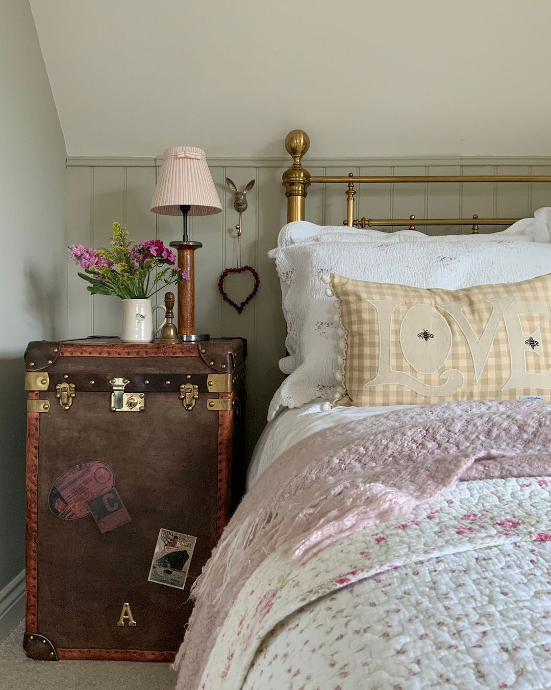 Vintage Bedroom Set with Luggage for Side Table. Photo by Instagram user @mimis_country_escape