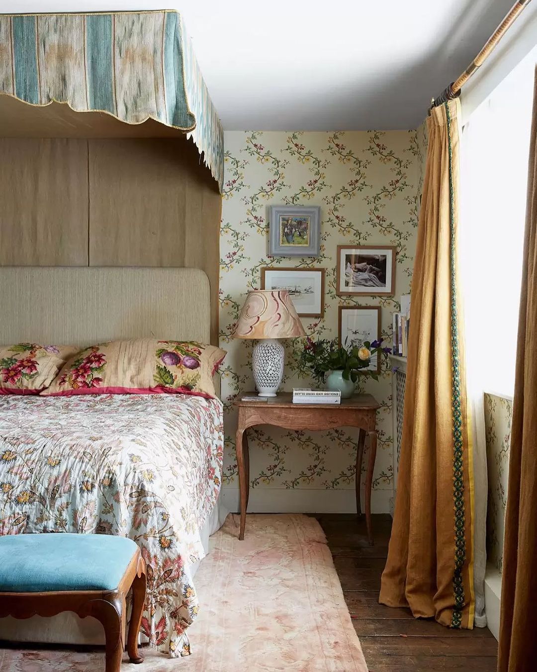 Bedroom with a Vintage Bed and Wallpaper using Cottagecore Design. Photo by Instagram user @houseandgardenuk