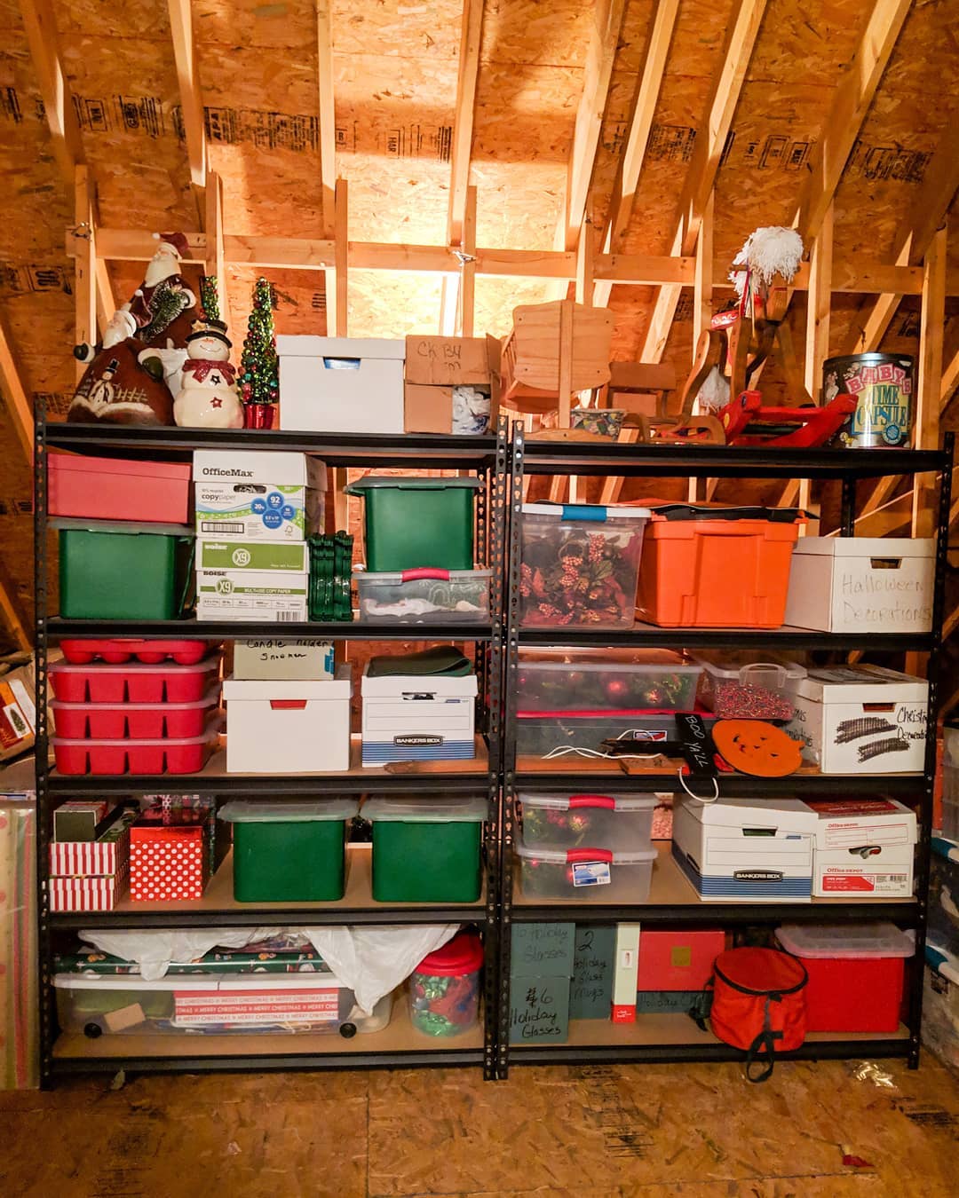 Attic Space with Metal Shelves for Storage. Photo by Instagram user @tabulated_organizingco