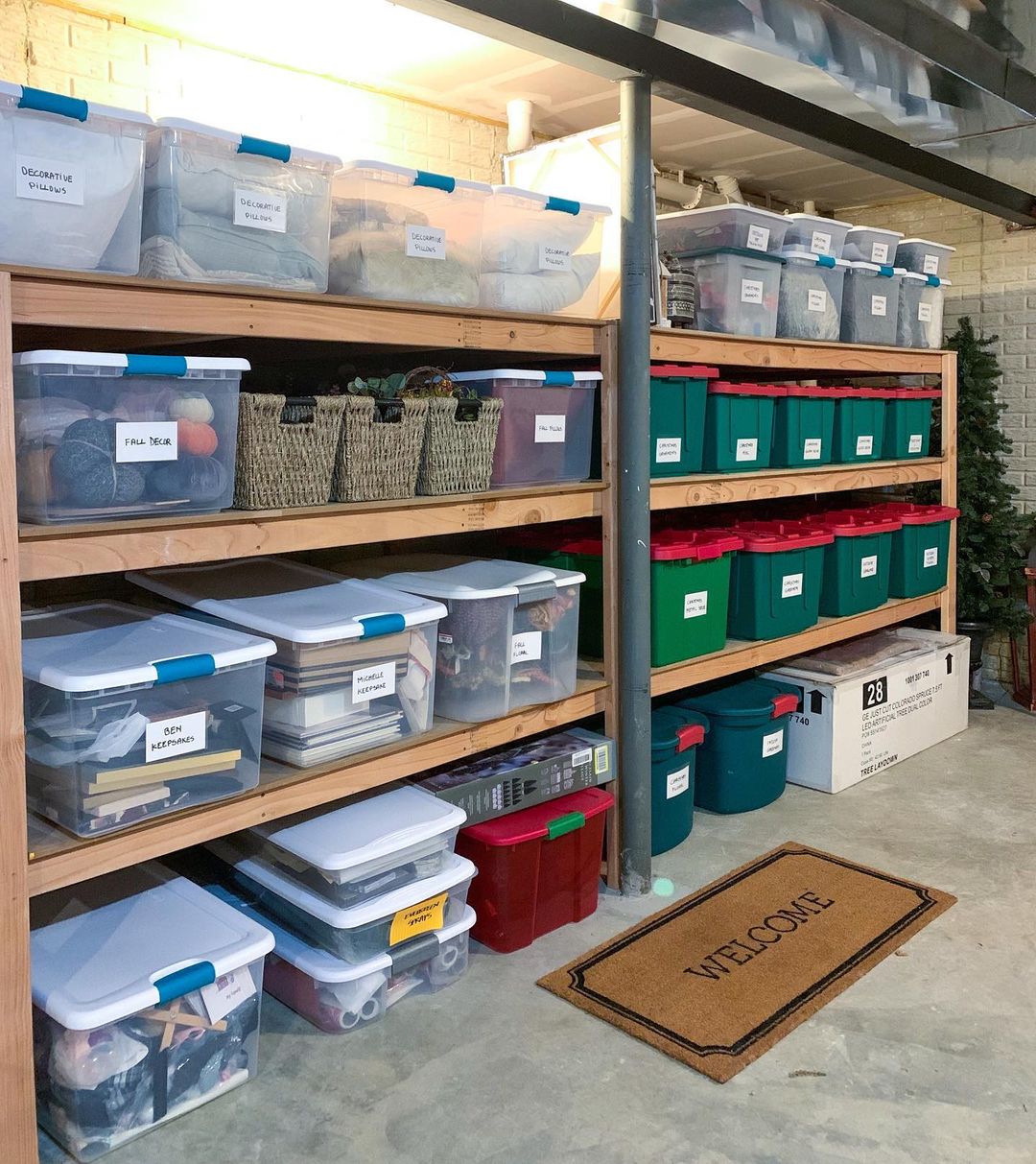 Basement Storage Space with Clear Totes on Shelves. Photo by Instagram user @time4organizing