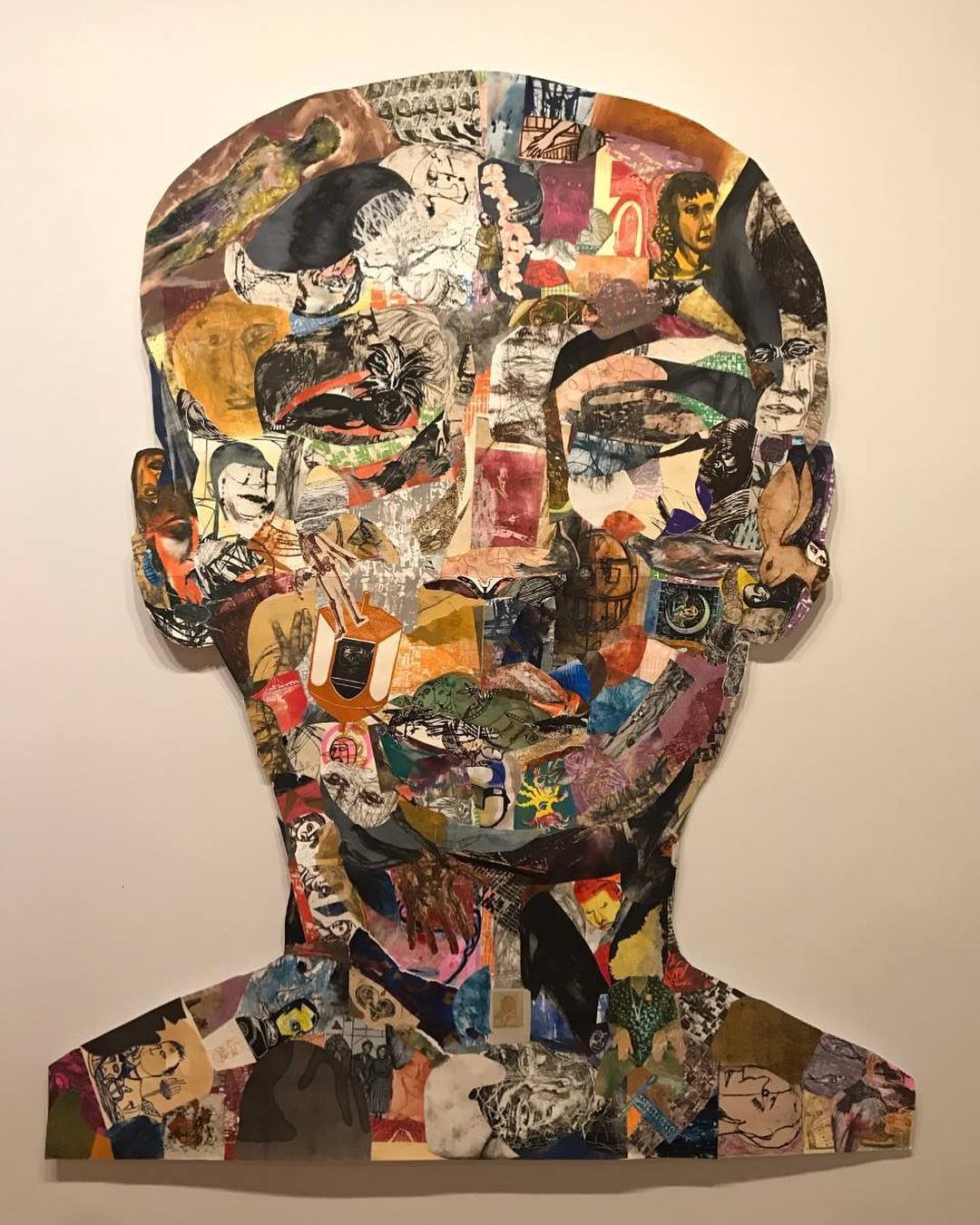 A collaborative project, Colossal Head features "collaging prints collected from the work of its members." Photo by Instagram user @molaa.art.