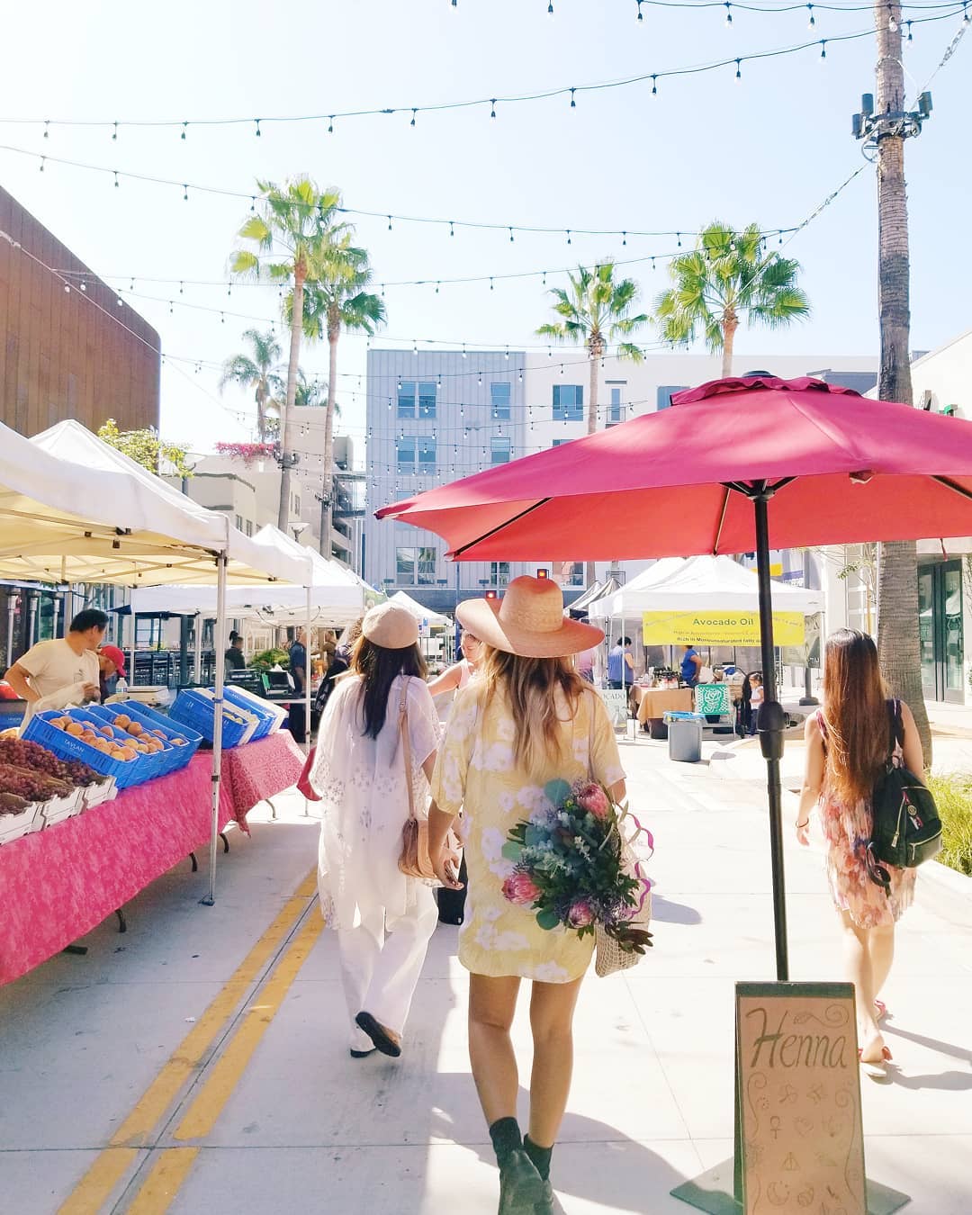 People walking through Downtown Long Beach Farmers Market. Photo by Instagram user @dtlbfarmersmarket.