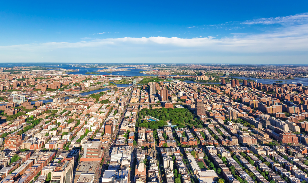 Aerial view of Bronx neighborhood grid with rivers and parks throughout