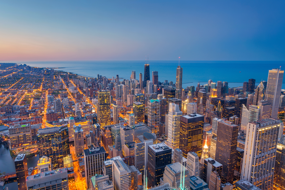 Aerial View of the Chicago Skyline Looking Out to Lake Michigan at Night