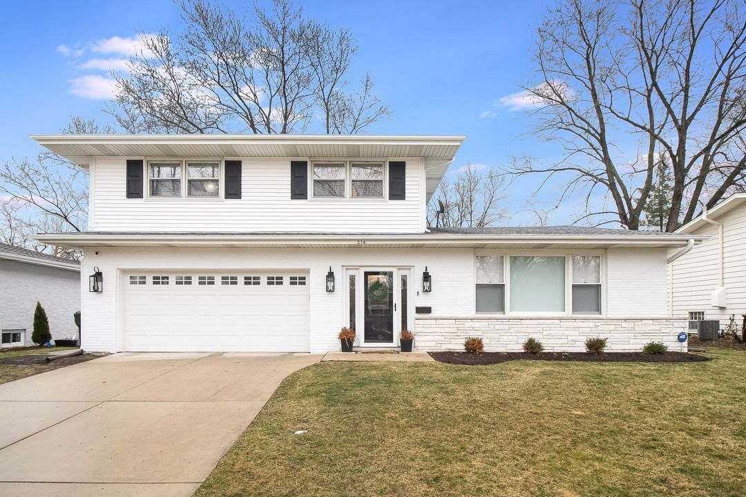 White, Two-Story Single Family Home in Naperville, IL. Photo by Instagram user @monarquegroup