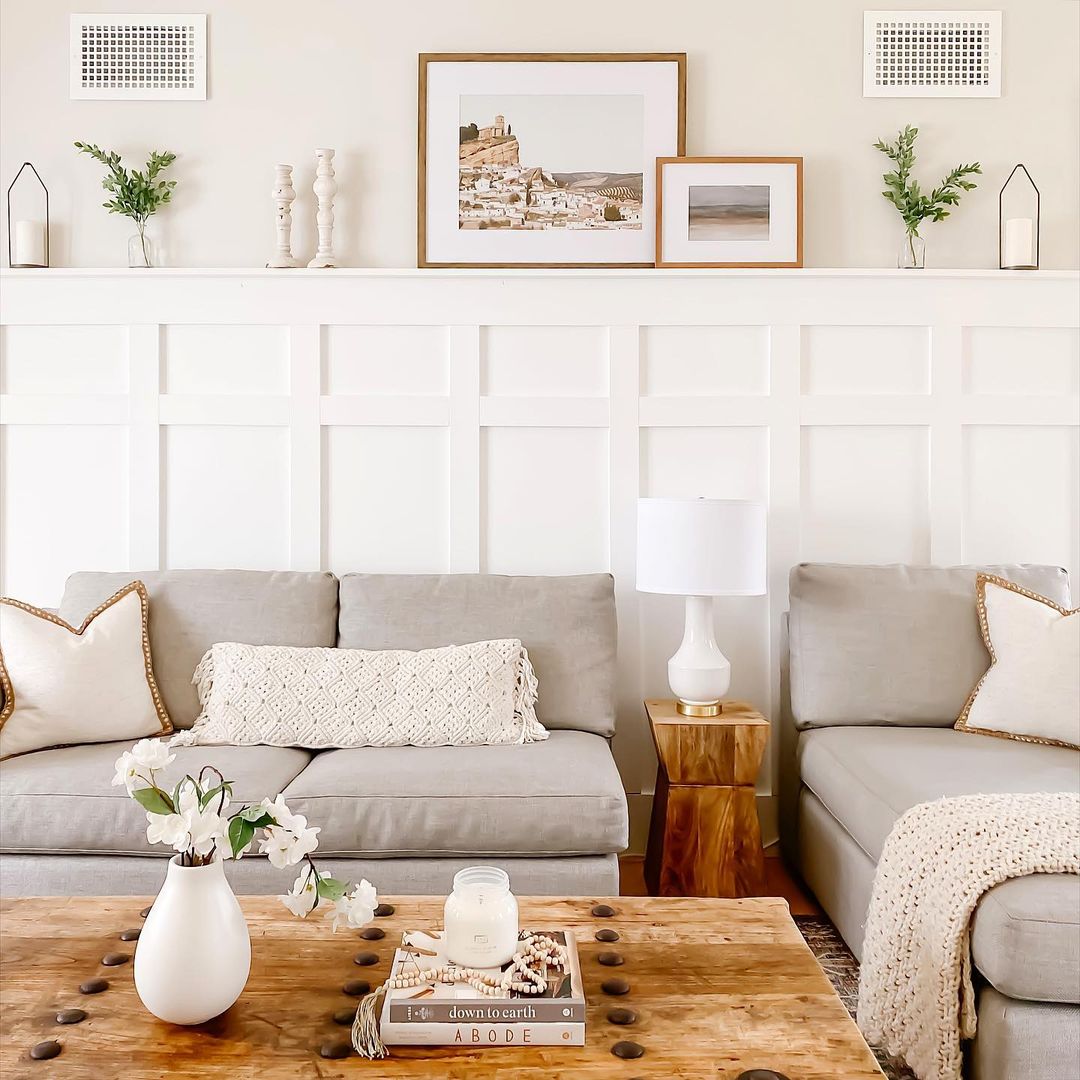 Living Room with White Board and Batten Walls Behind Gray Couches. Photo by Instagram user @my_bdesignd_life