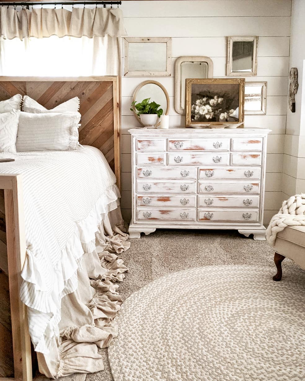 Farmhouse Bedroom with Distressed Dresser. Photo by Instagram user @downshilohroad