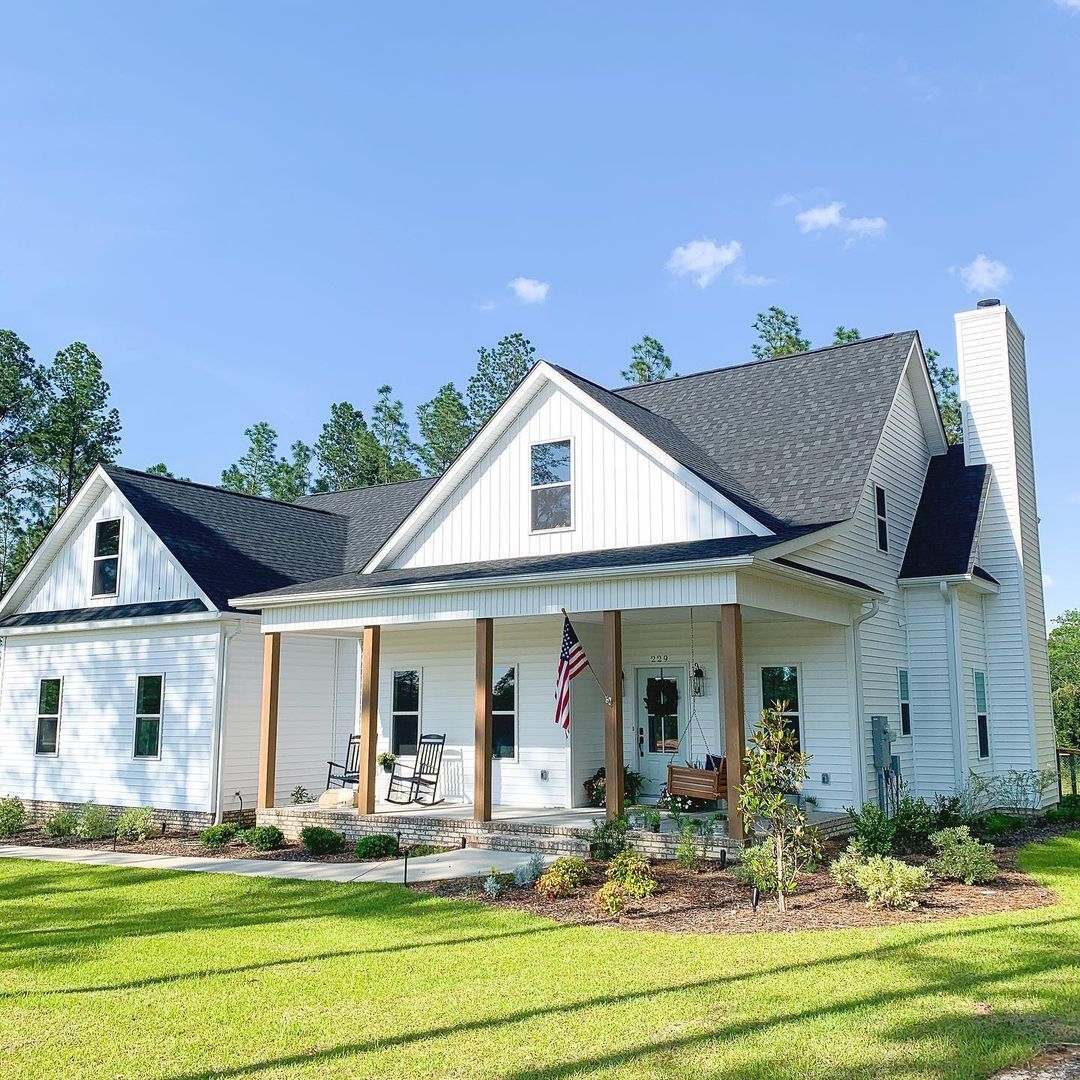 Traditional Farmhouse Style with Exterior Painted White. Photo by Instagram user @thegroenstead