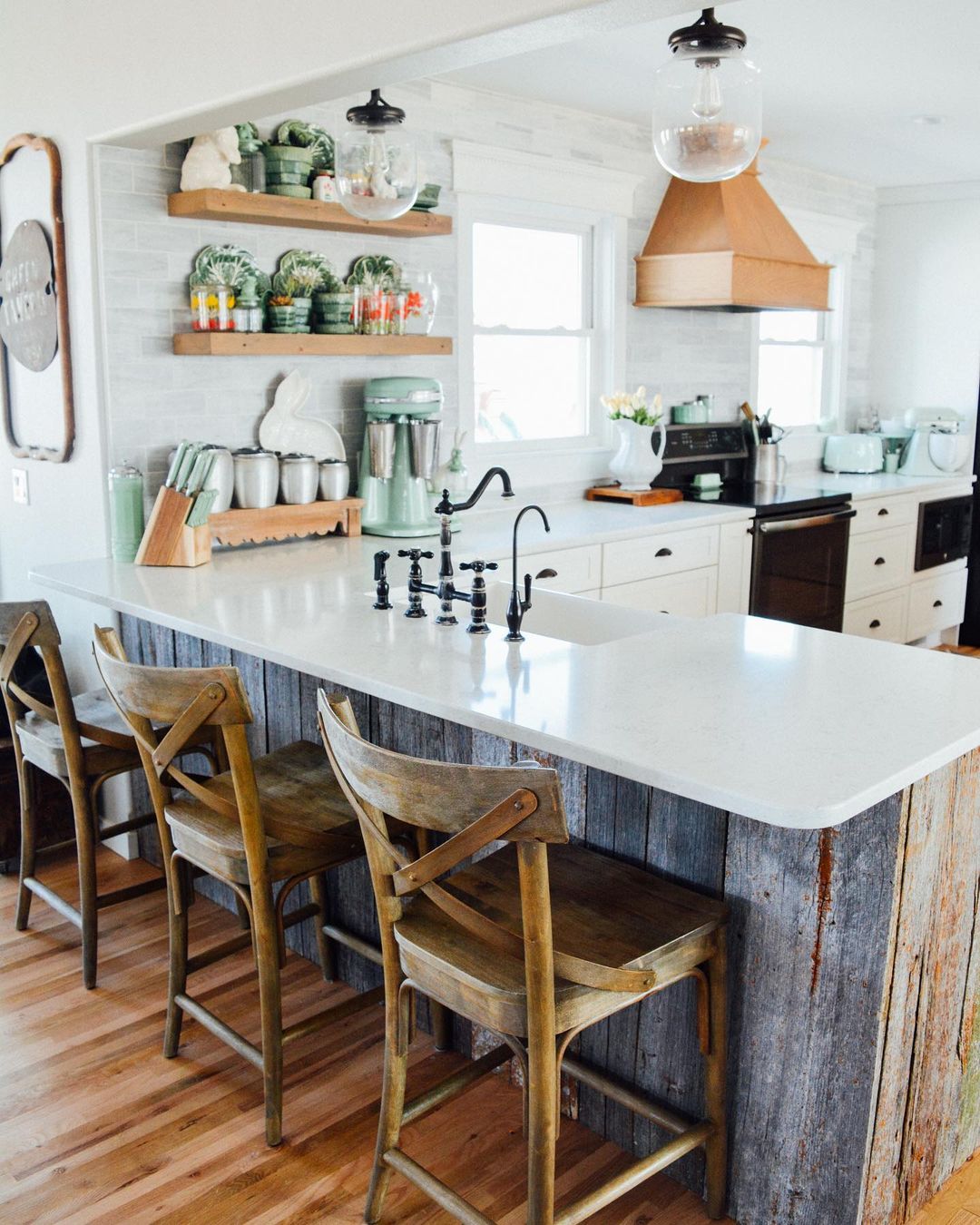 Farmhouse Kitchen with Reclaimed Wooden Bar Stools. Photo by Instagram user @thevettelfarm