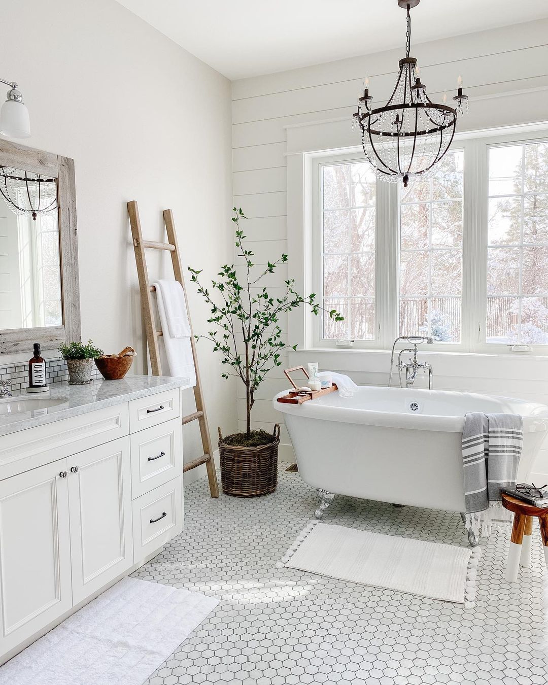 Refinished Bathroom with Shiplap Wall and Clawfoot Tub. Photo by Instagram user @houseofmurphy