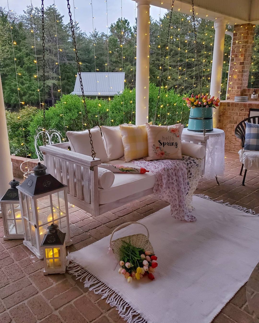 Outdoor Covered Patio with a Hanging Chair. Photo by Instagram user @happydaysfarm