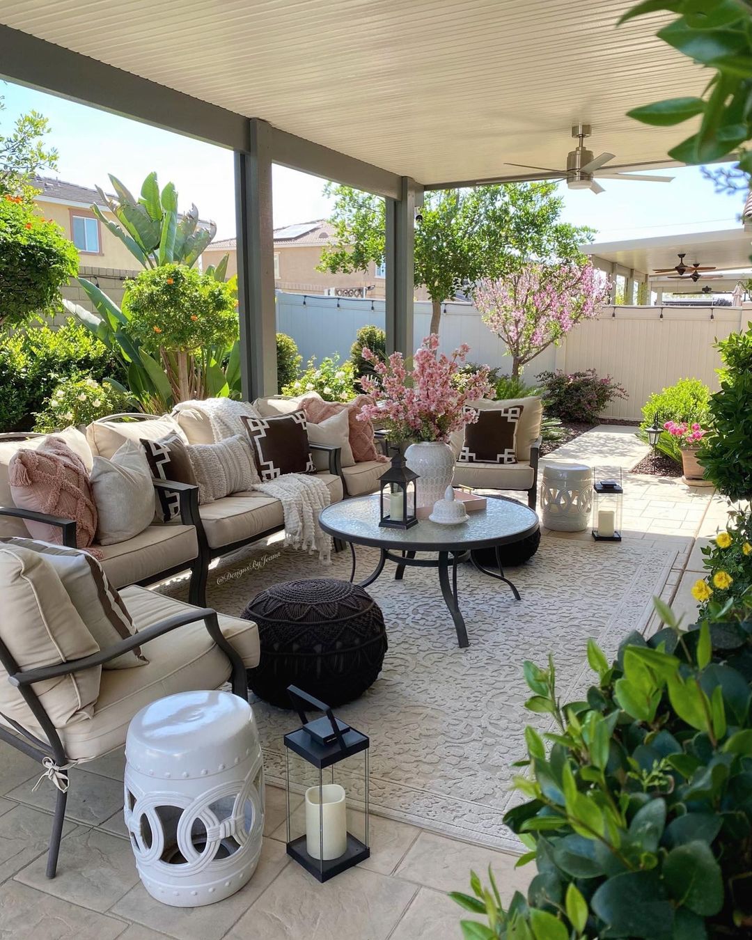 Backyard Living Space with Large Couch. Photo by Instagram user @designsbyjeana