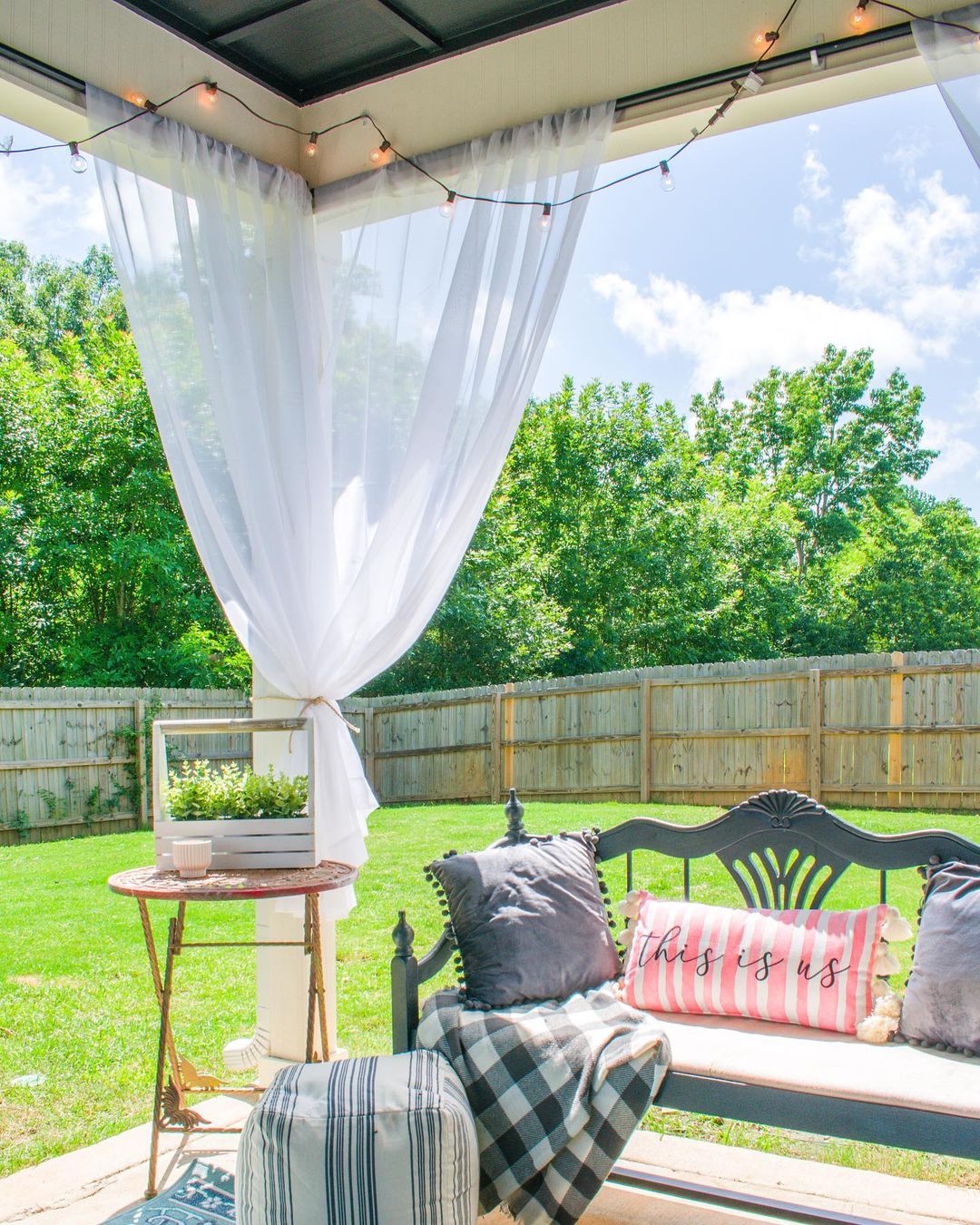 Backyard Patio with Outdoor Curtains. Photo by Instagram user @southernyankeediy