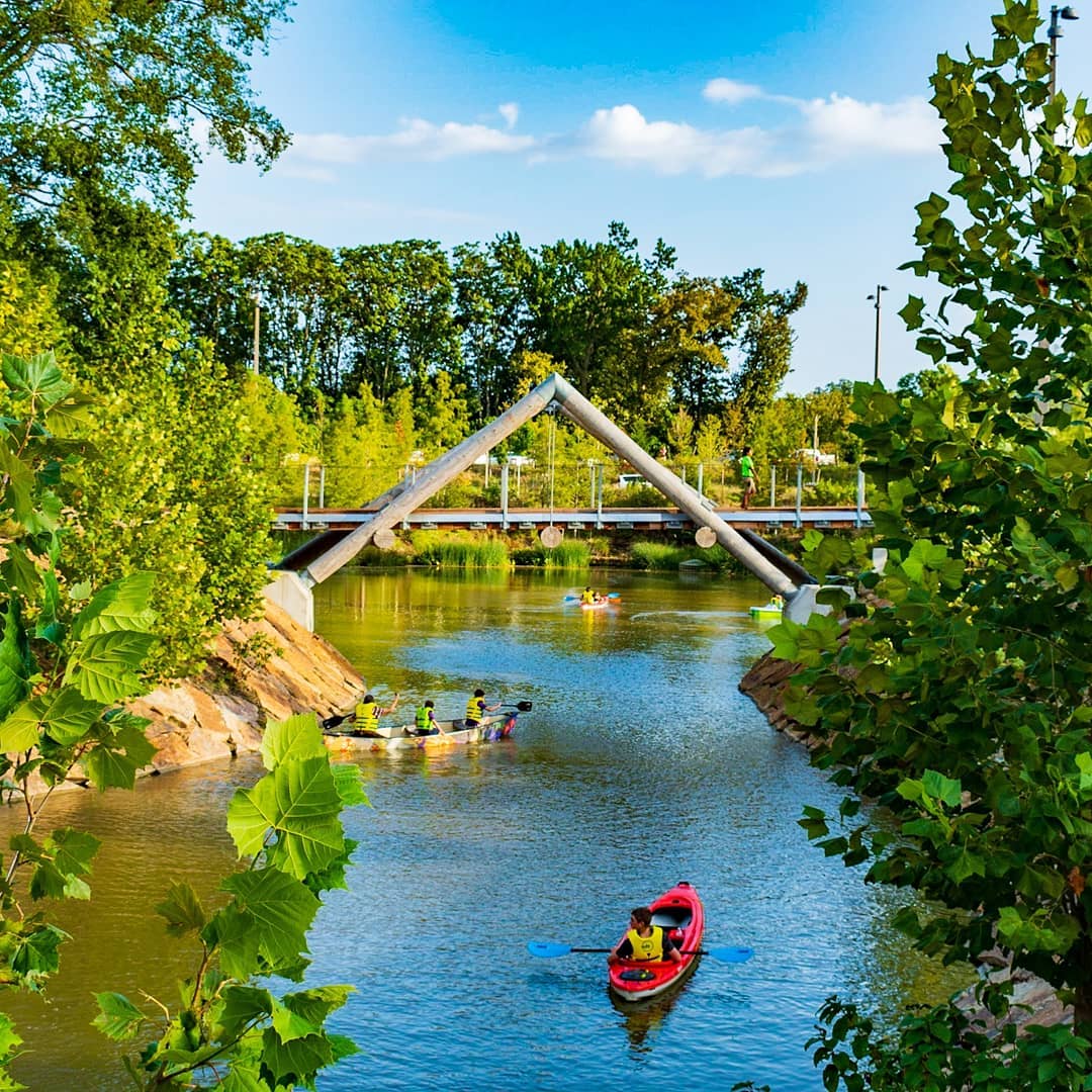 Person in a Kayak at the Gathering Place Tulsa. Photo by Instagram user @ok_gotakeahike