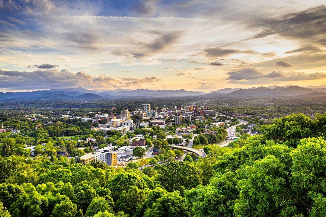 View of Downtown Asheville, NC with Fall Foliage in View. Photo by Instagram user @jared_kay