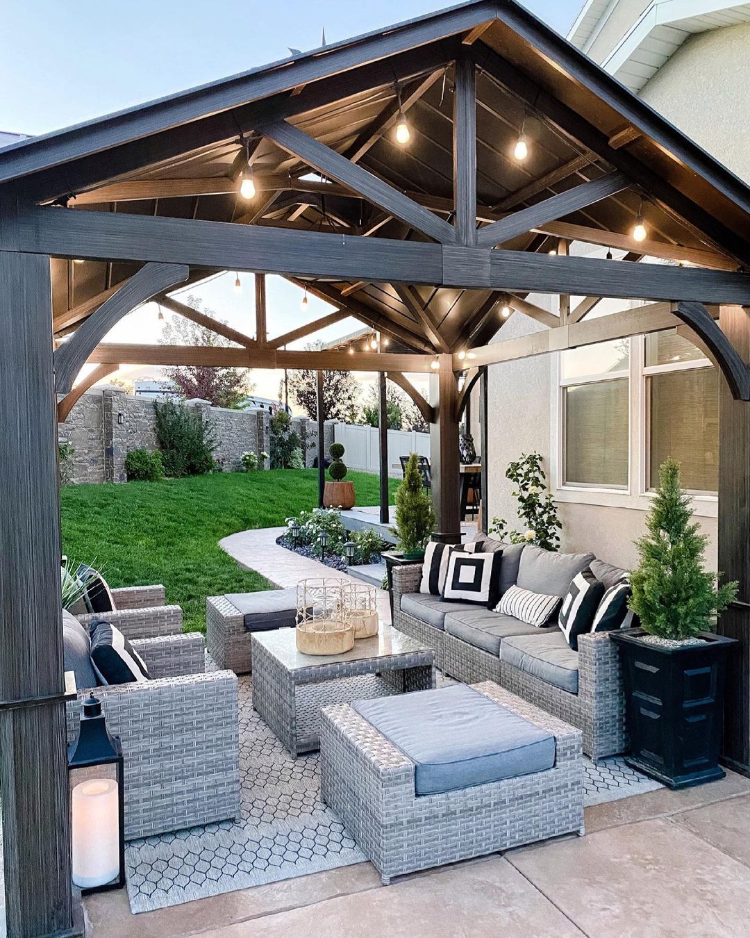 Backyard Pergola Installed Over Sitting Area. Photo by Instagram user @greybirchdesigns