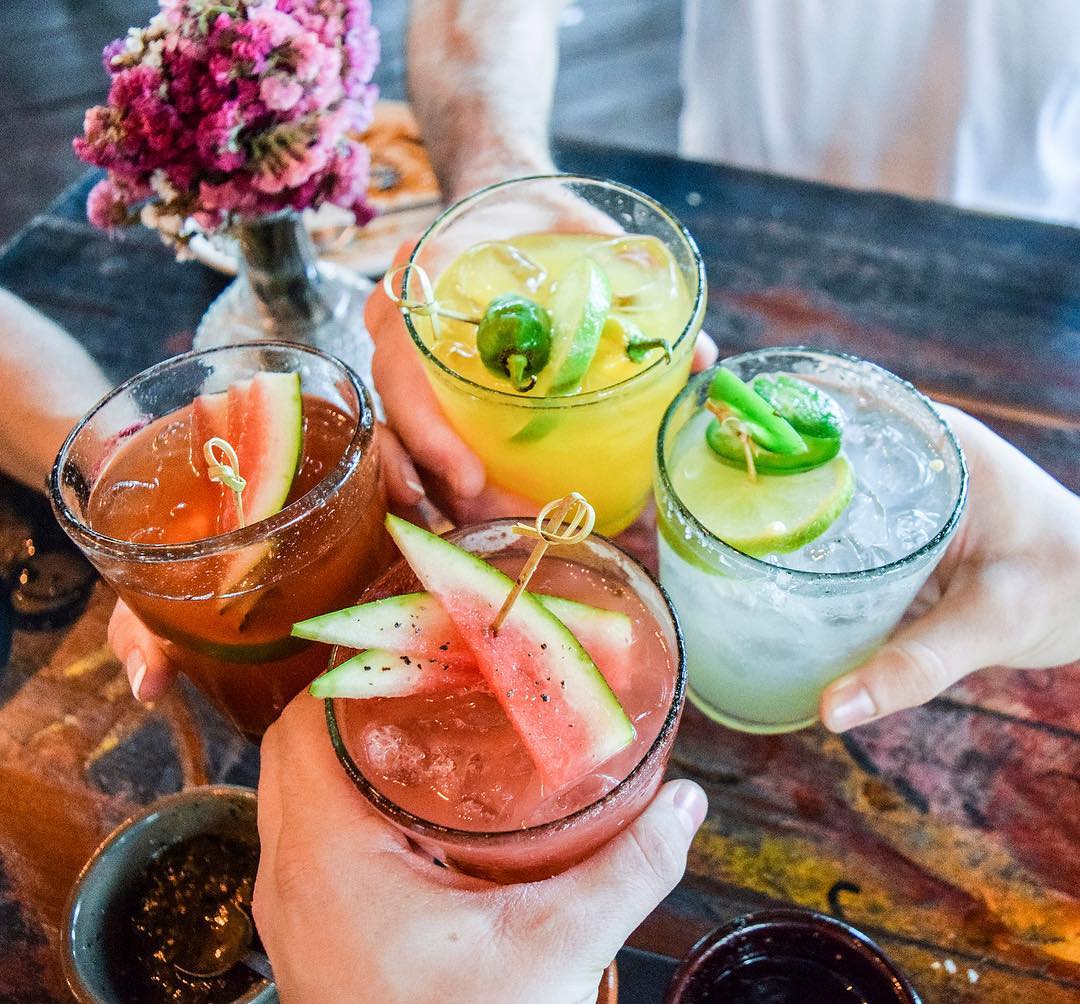 People Cheersing Multiple Drinks. Photo by Instagram user @permasteelinc