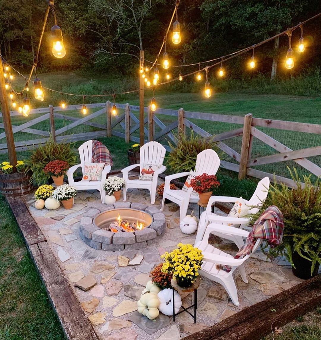 Separate Fire Pit Seating Area with String Lights Overhead. Photo by Instagram user @crateandcottage