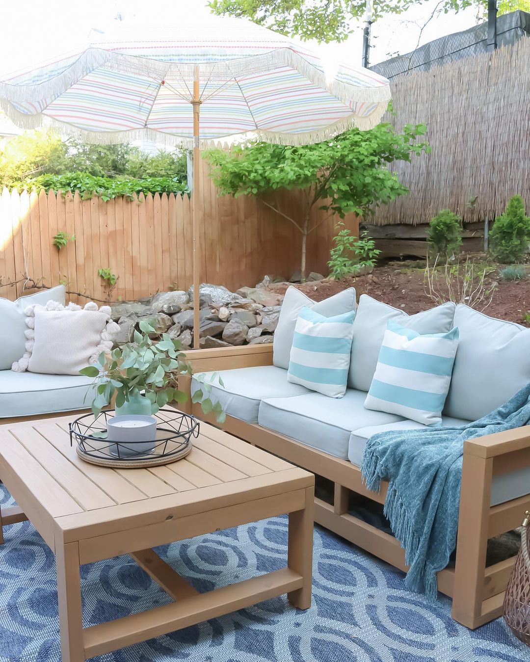 Wooden Outdoor Living Space Furniture. Photo by Instagram user @theprettylittlehome