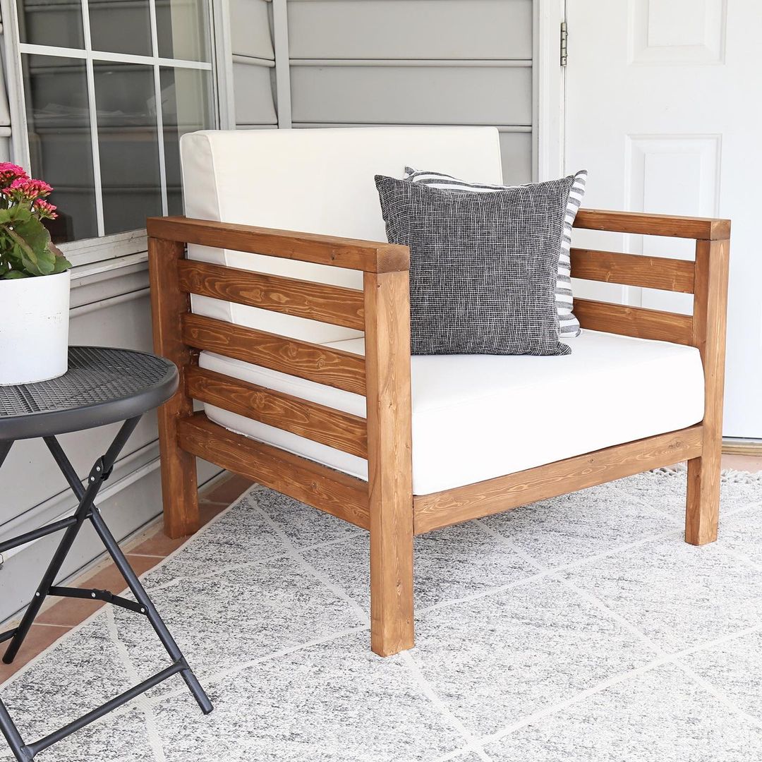 Wooden Outdoor Chair on a Patio. Photo by Instagram user @angelamariemade