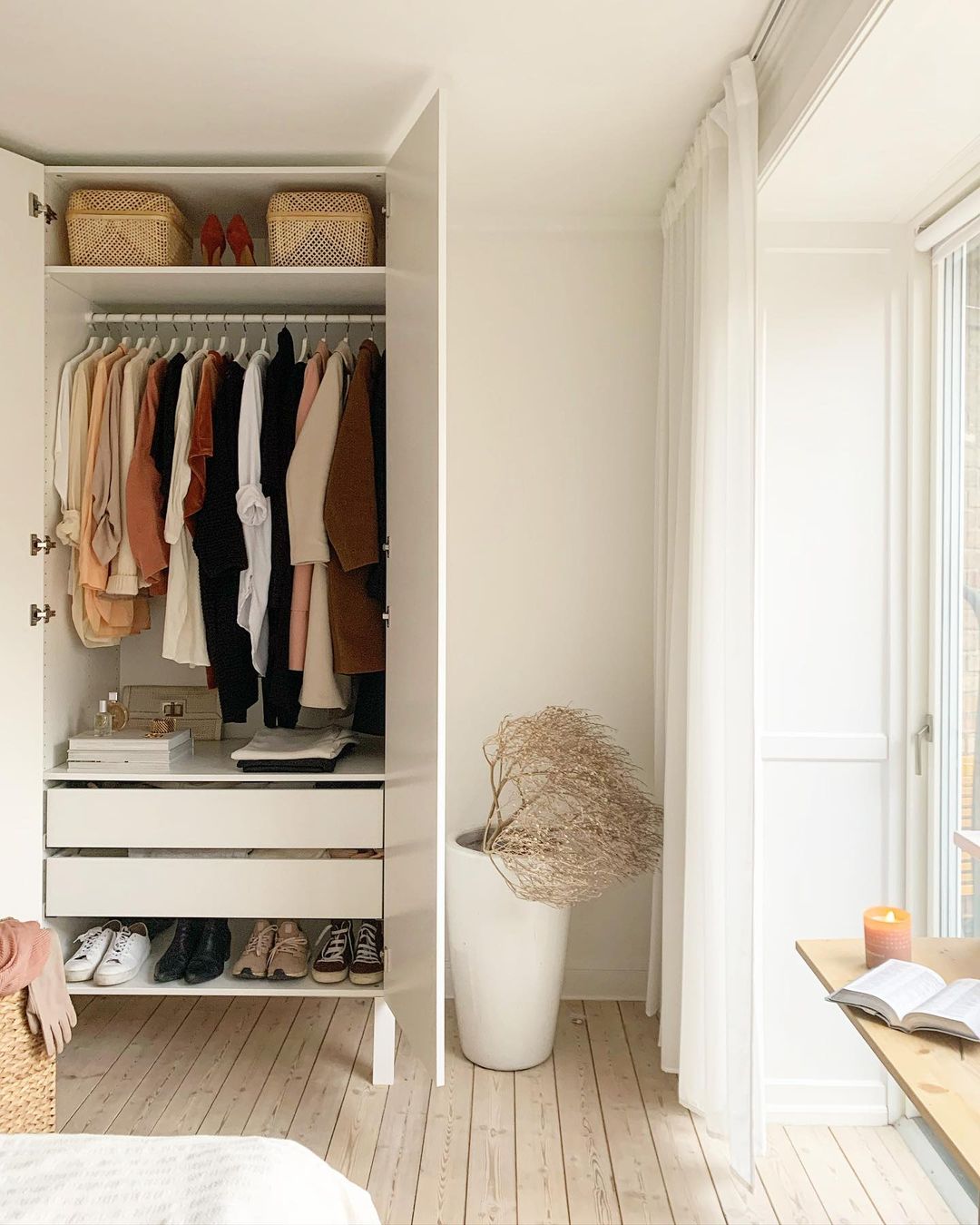 Clean Closet in a Bedroom. Photo by Instagram user @scandinavianstylist