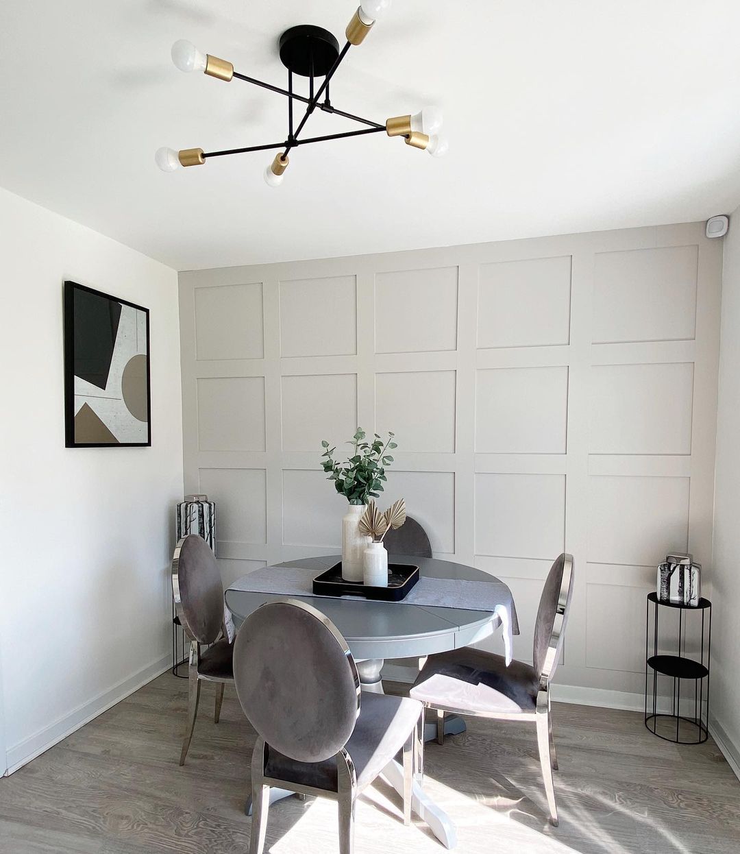 Dining Room with Board and Batten Wall. Photo by Instagram user @styled_by_ja