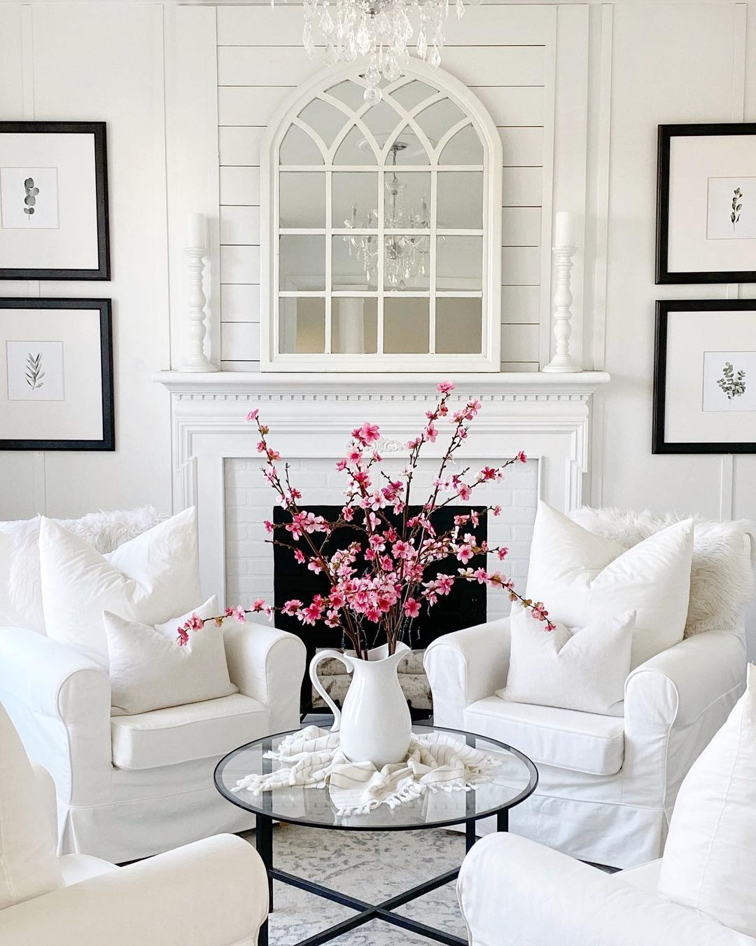 Sitting Room with White Furniture and White Walls. Photo by Instagram user @adventuresindecorating1