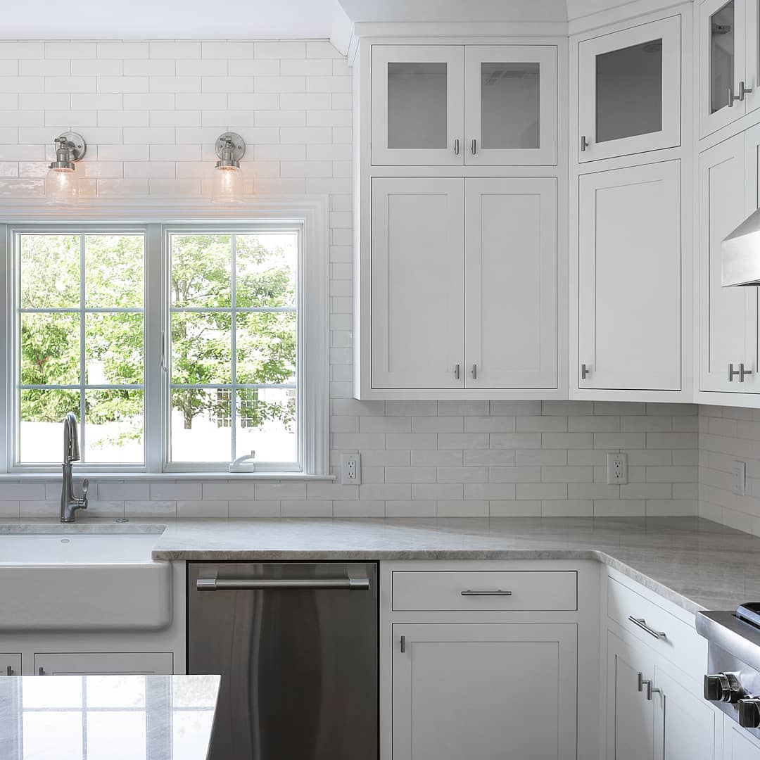 Updated Farmhouse Kitchen with White Cabinets. Photo by Instagram user @cabinetjoint