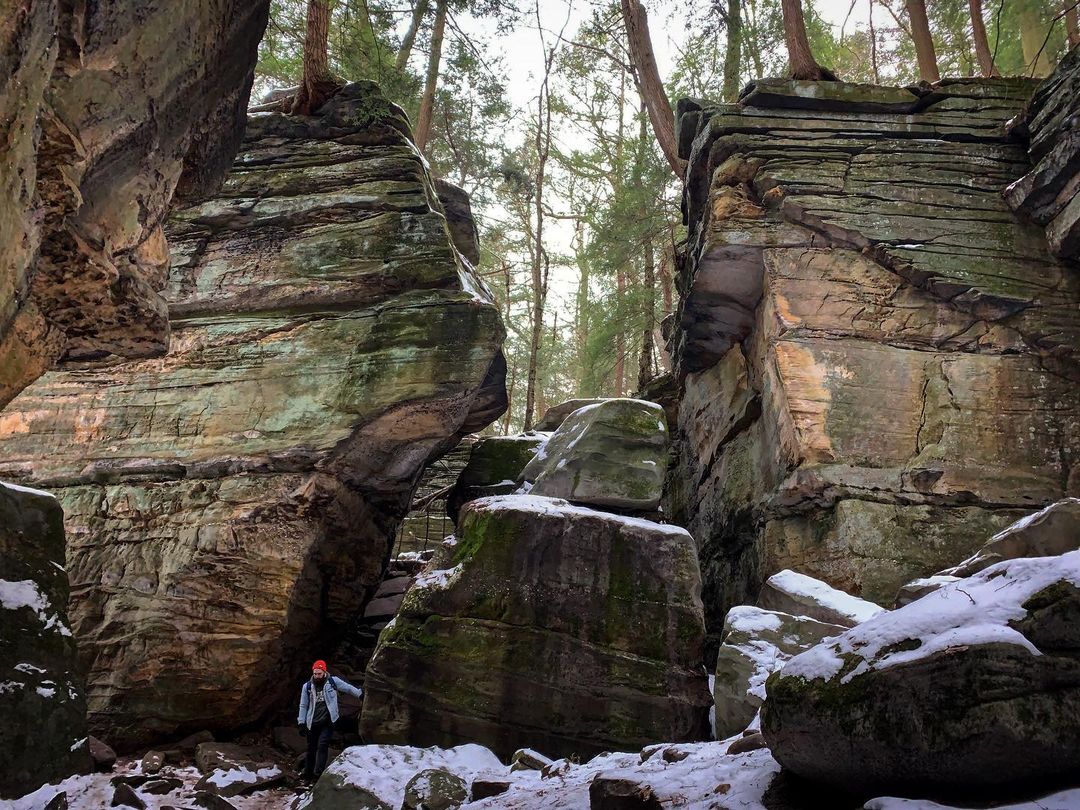 Person Walking Between the Ledges in Cleveland, OH. Photo by Instagram user @wildernesswithchris