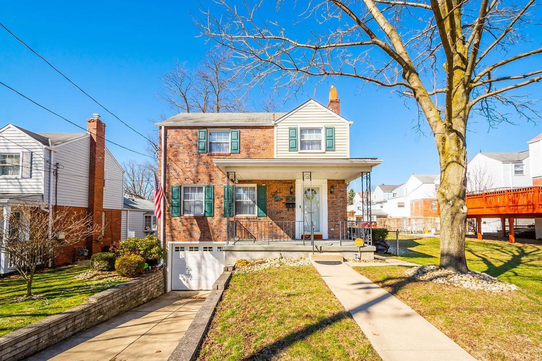 Brick House in Beechview with a yard and one-car garage. Photo from Instagram user @bkirchner_realtor