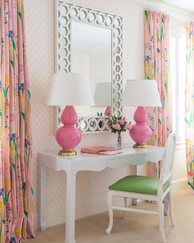 Sitting Area in a Bedroom with White Desk and Pink Lamps. Photo by Instagram user @megbraffdesigns