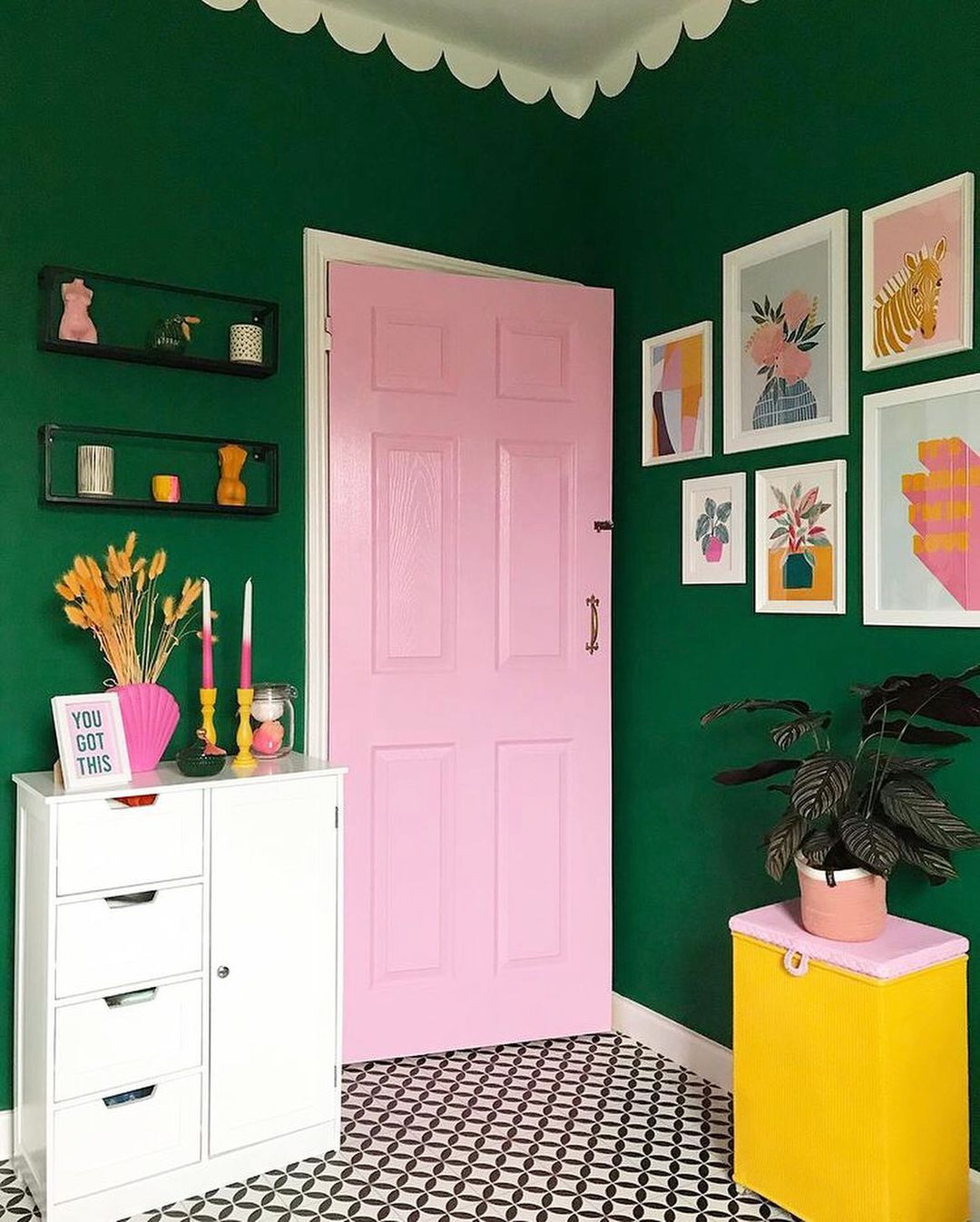 Bathroom Door Painted Pink with Dark Green Walls. Photo by Instagram user @nia_does_diy