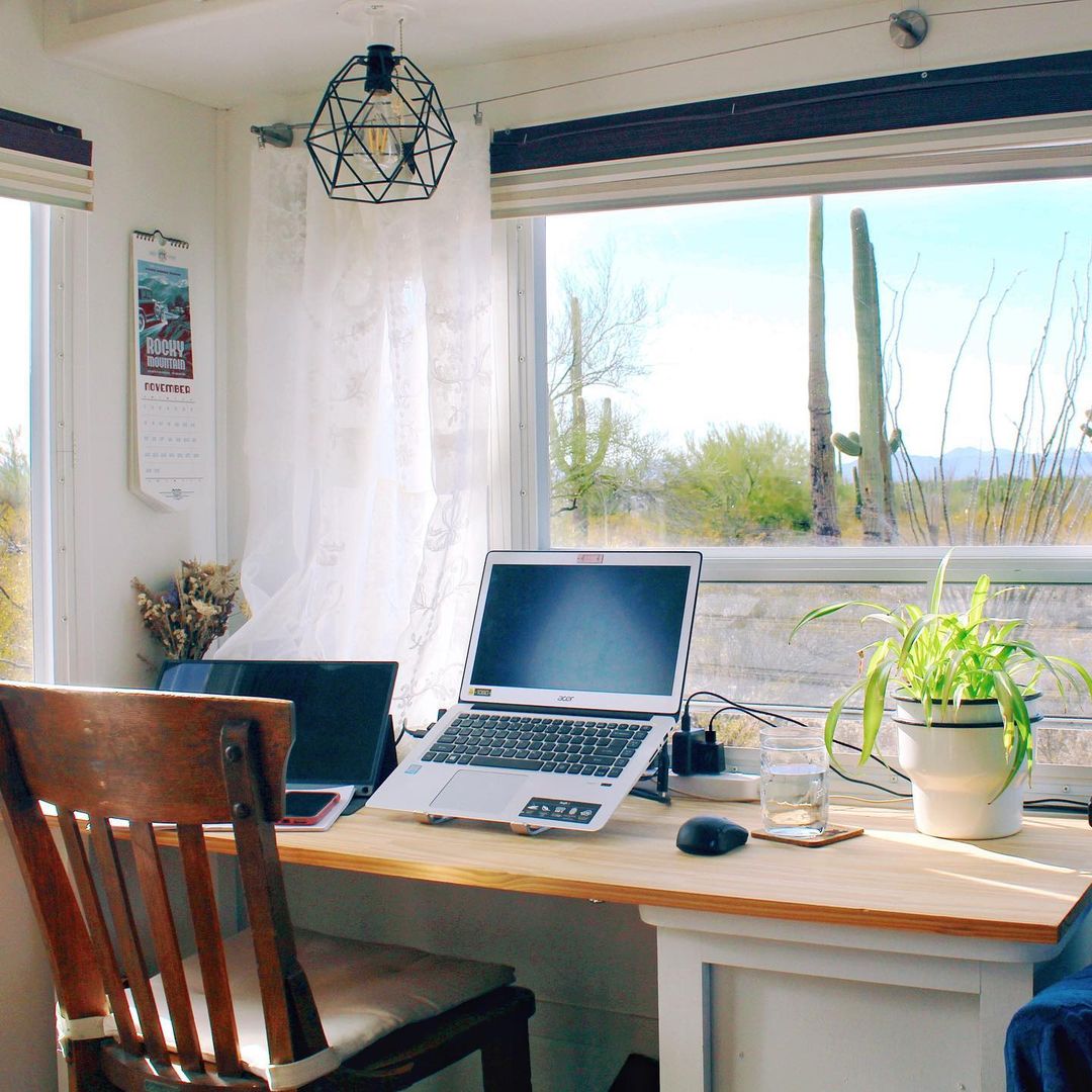 Simple Workspace Inside of a Parked RV. Photo by Instagram user @thetasteforadventure