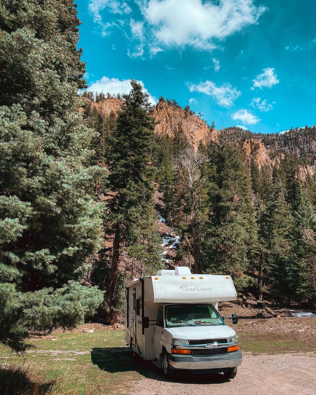 RV Parked in the Mountains in Colorado. Photo by Instagram user @quenchyouradventure