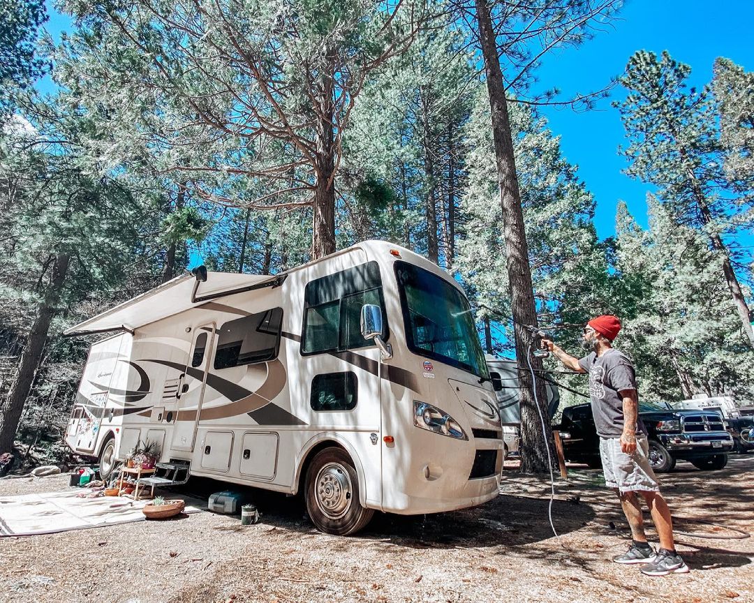 Guy Washing the Front Windshield of an RV. Photo by Instagram user @restless_russells