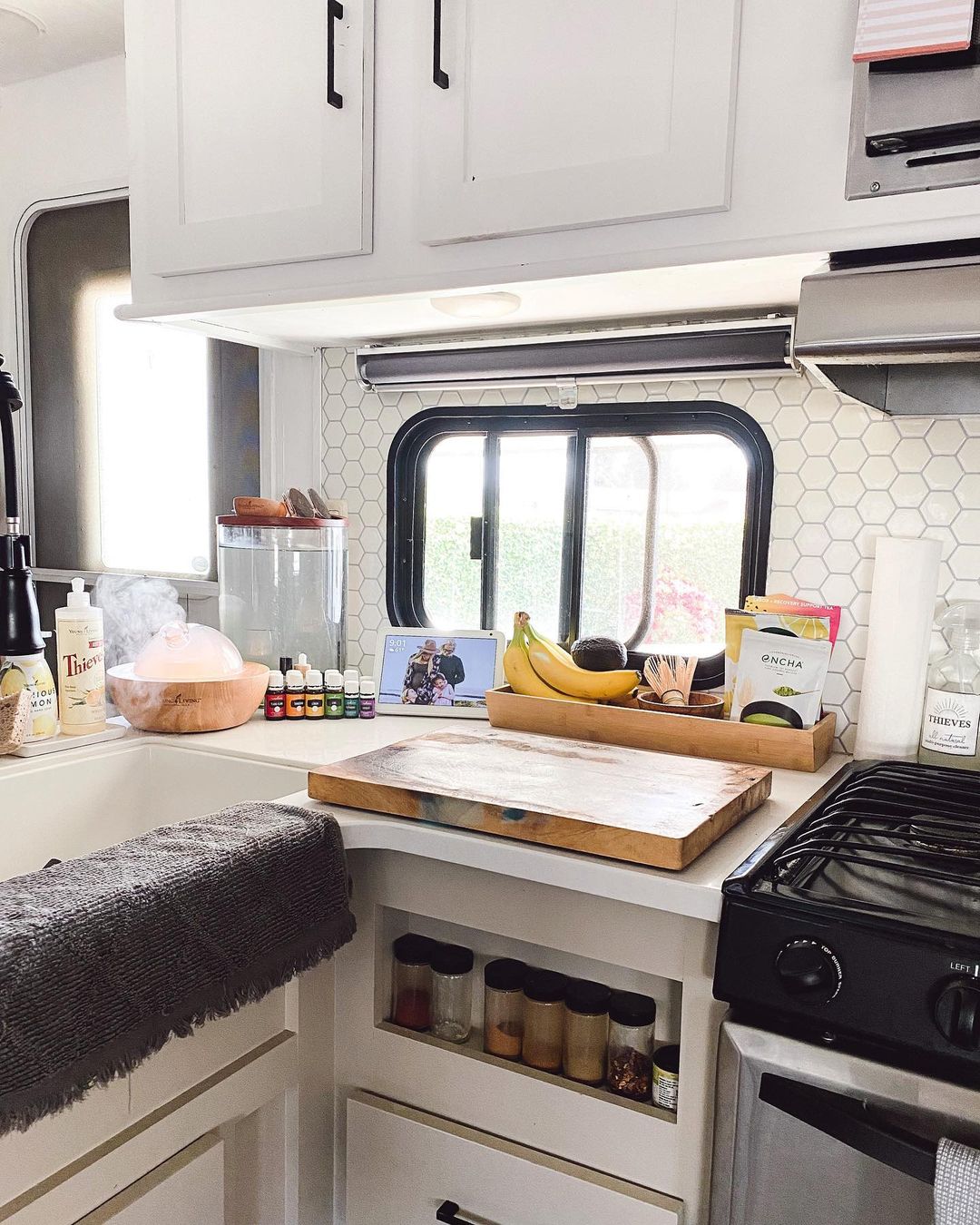 Clean Kitchen Area in an RV. Photo by Instagram user @ourstormyskyy