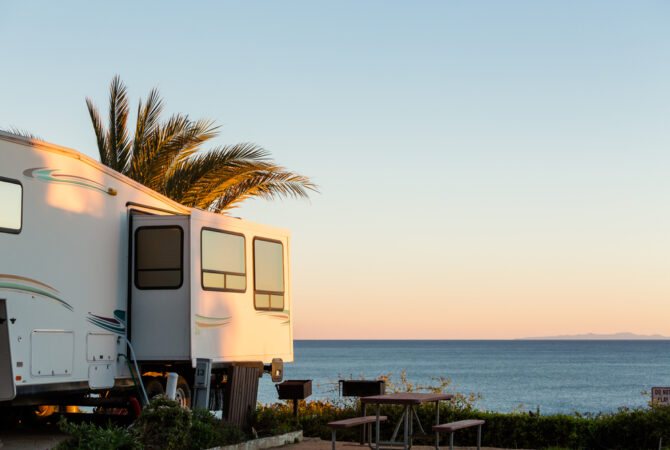 RV parked by the ocean in California.
