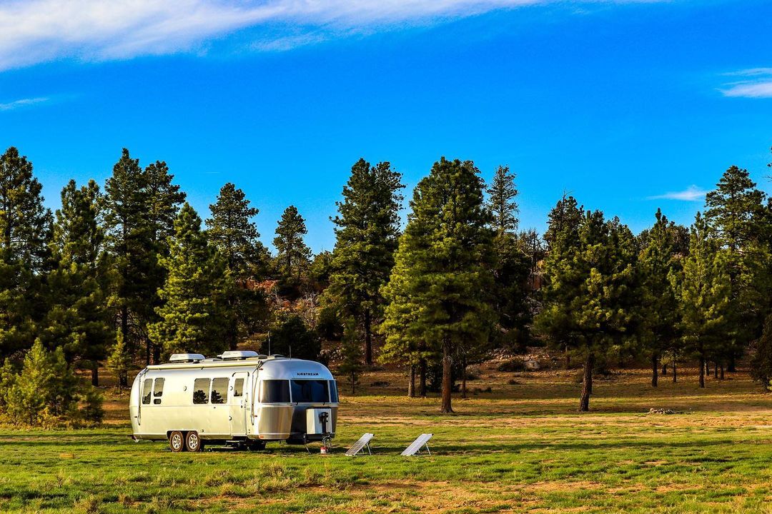 Airstream RV boondocking in peaceful nature area. Photo by Instagram User @thisairstreamlife